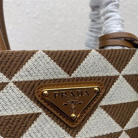 PRADA Symbole jacquard fabric micro bag / Prada triangle 